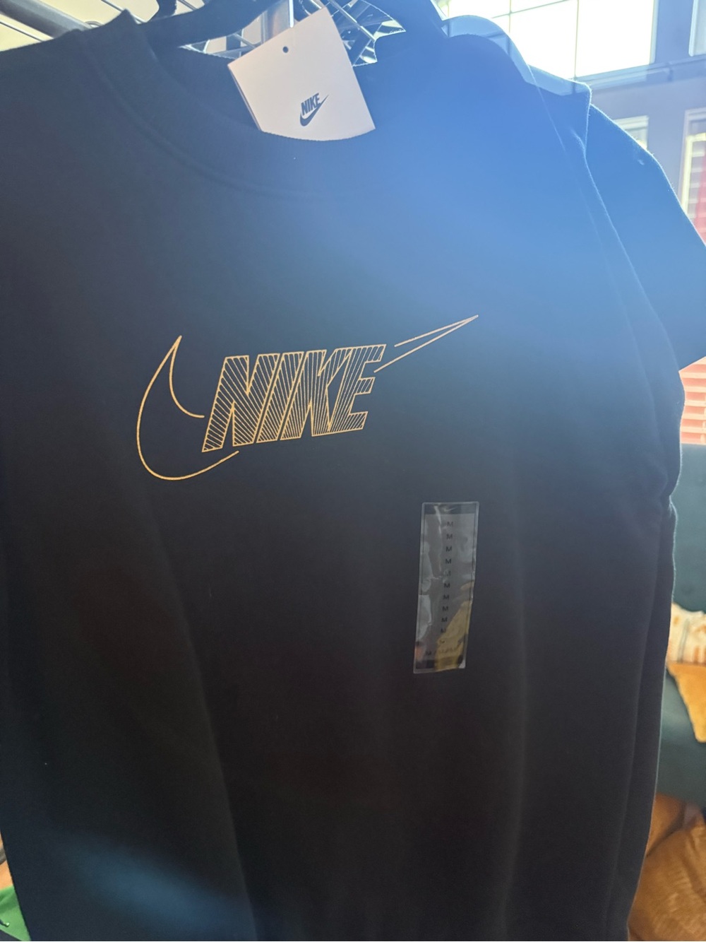 Nike Black crewneck with Gold Swoosh